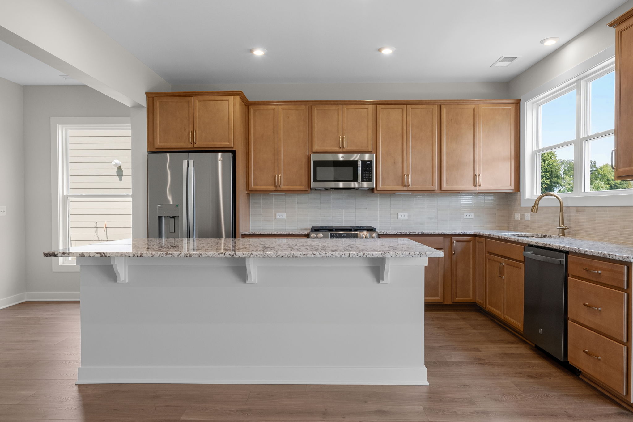 Kitchen with center island and stainless appliances at 9312 Woodgate Circle in Alvaton, KY