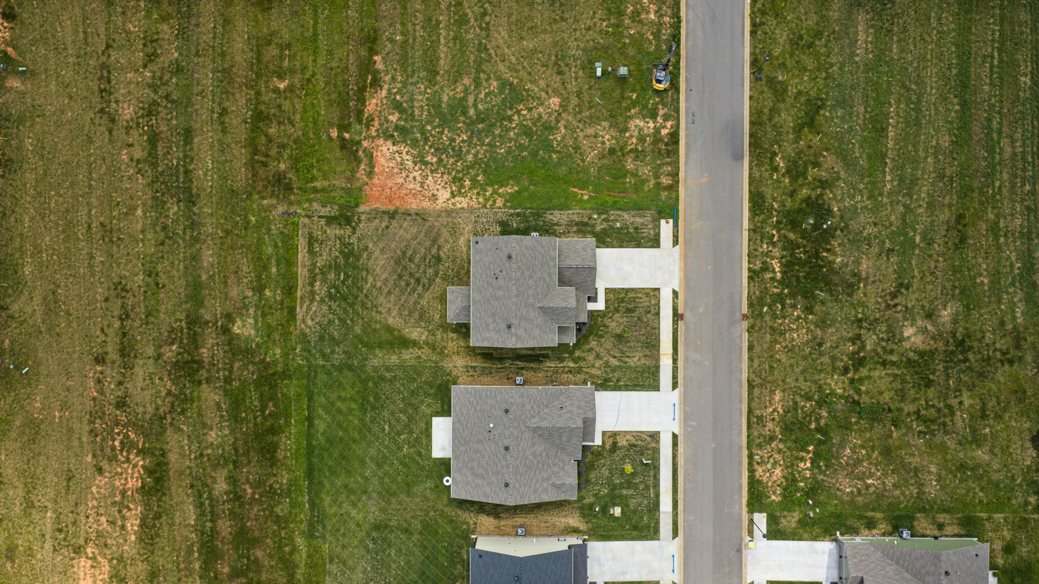 Overhead aerial view of the 60 by 155 foot lot at 9312 Woodgate Circle in Alvaton, KY