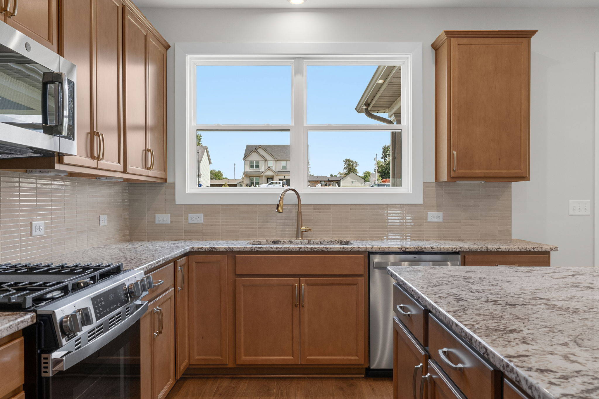 Kitchen sink beneath the window at 9312 Woodgate Circle in Alvaton, KY