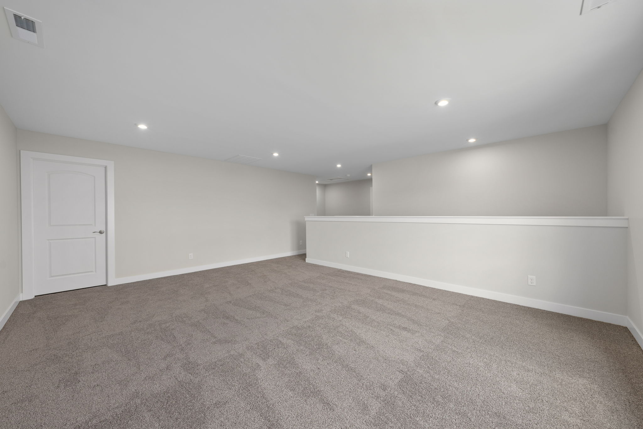 Wide view of the second-floor bonus room at 9312 Woodgate Circle in Alvaton, KY