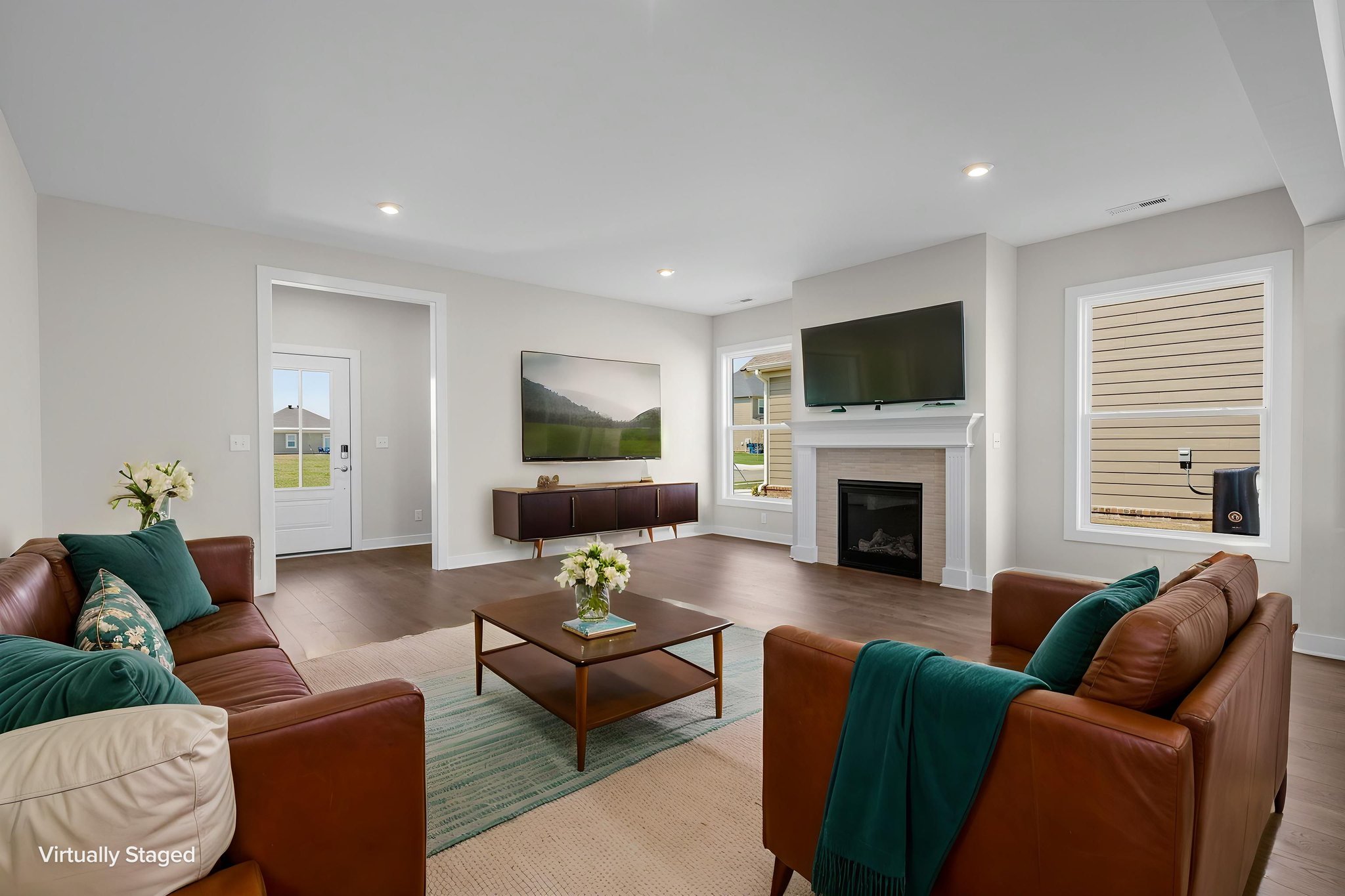 Family room with gas fireplace at 9312 Woodgate Circle in Alvaton, KY, virtually staged