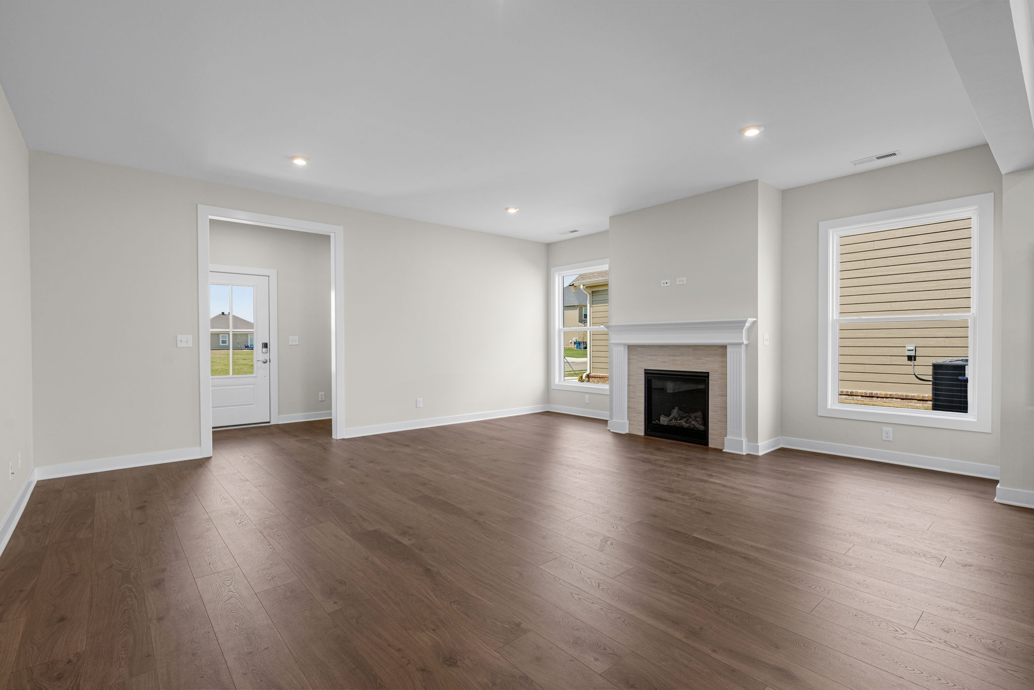 Open family room and gas fireplace at 9312 Woodgate Circle in Alvaton, KY