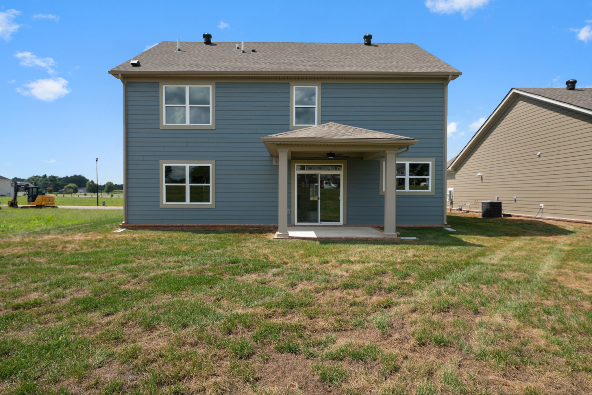 Rear elevation and backyard at 9312 Woodgate Circle in Alvaton, KY