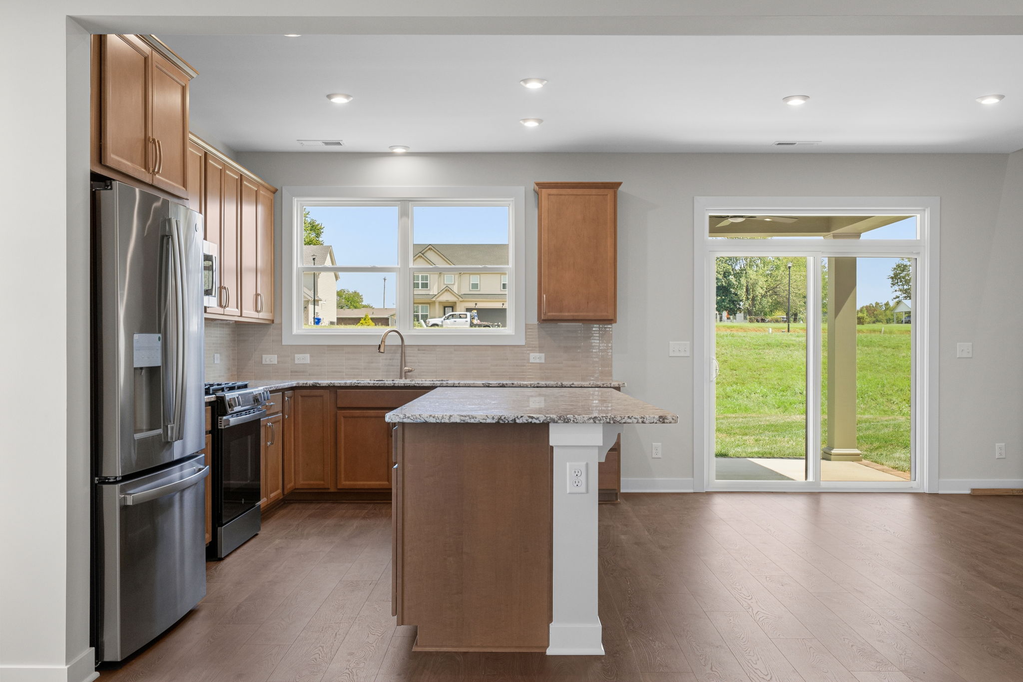 Kitchen viewed from the family room at 9312 Woodgate Circle in Alvaton, KY